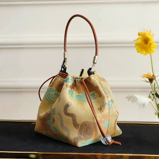 Songjin yellow retro hand-held crossbody mobile phone bucket bag