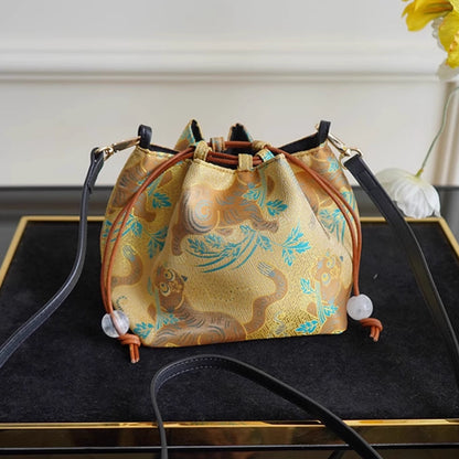 Songjin yellow retro hand-held crossbody mobile phone bucket bag