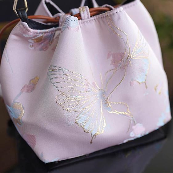 Songjin light pink retro hand-held crossbody mobile phone bucket bag