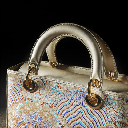 New Chinese style seawater river cliff cowhide handbag 2025 new large national style brocade commuter messenger women's bag