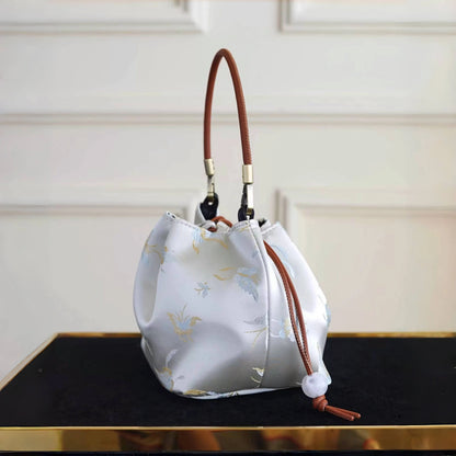 Songjin white retro hand-held crossbody mobile phone bucket bag