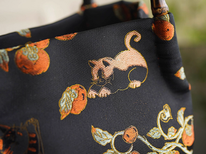 Songjin silk persimmon cat bamboo handbag