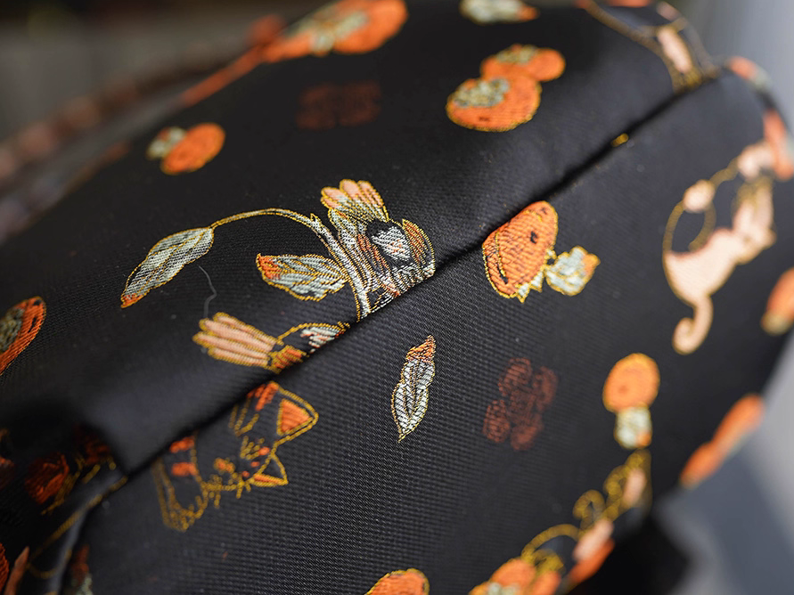 Songjin silk persimmon cat bamboo handbag